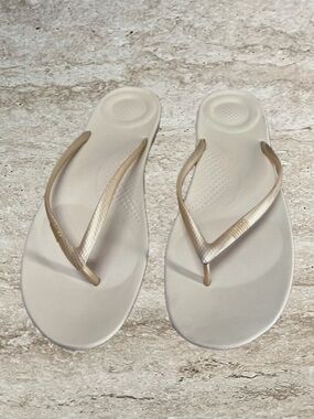 FitFlop Women's Ivory Flip Flop Sandals with Gold Straps